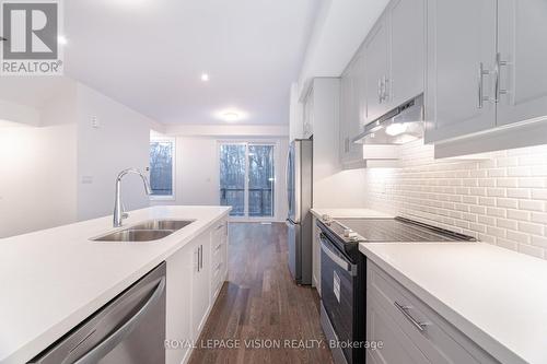 56 Folcroft Street, Brampton, ON - Indoor Photo Showing Kitchen With Stainless Steel Kitchen With Double Sink With Upgraded Kitchen