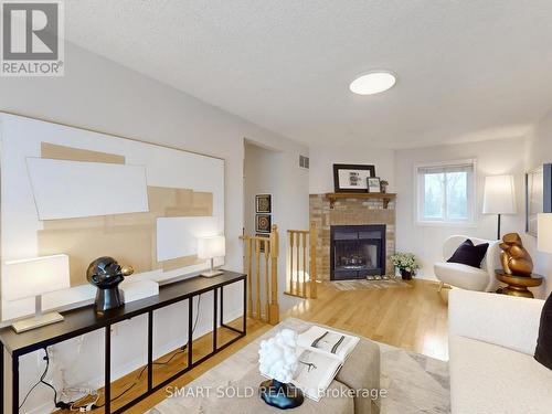 633 Four Winds Way, Mississauga, ON - Indoor Photo Showing Living Room With Fireplace