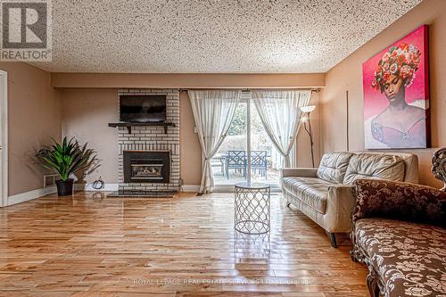 2483 Yarmouth Crescent N, Oakville, ON - Indoor Photo Showing Living Room With Fireplace