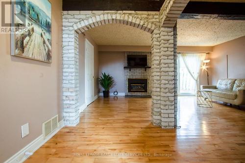 2483 Yarmouth Crescent N, Oakville, ON - Indoor Photo Showing Living Room With Fireplace