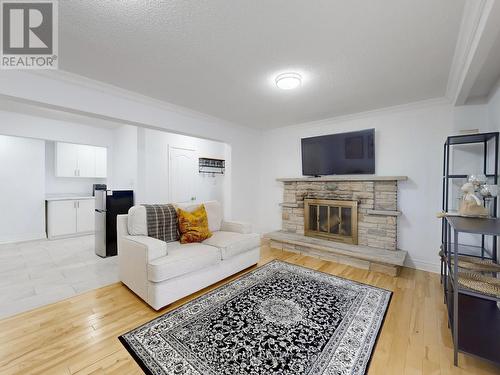 9 Fairchild Avenue, Toronto, ON - Indoor Photo Showing Living Room With Fireplace