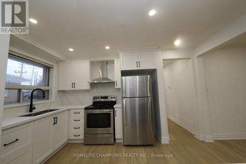 25 Crusader Street, Toronto, ON - Indoor Photo Showing Kitchen With Stainless Steel Kitchen With Double Sink