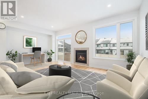 811 Clapham Terrace, Ottawa, ON - Indoor Photo Showing Living Room With Fireplace