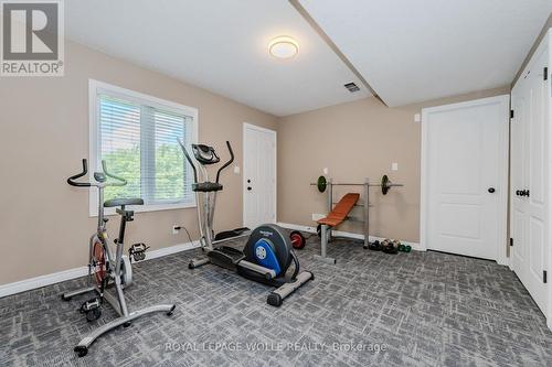 174 River Run Road, Mapleton, ON - Indoor Photo Showing Gym Room