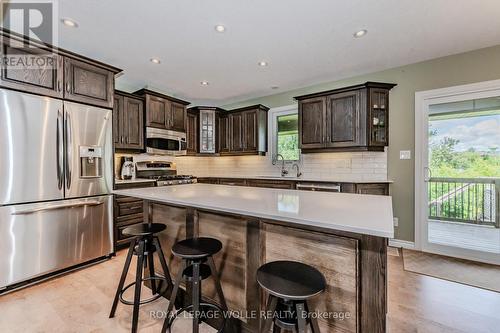 174 River Run Road, Mapleton, ON - Indoor Photo Showing Kitchen With Upgraded Kitchen