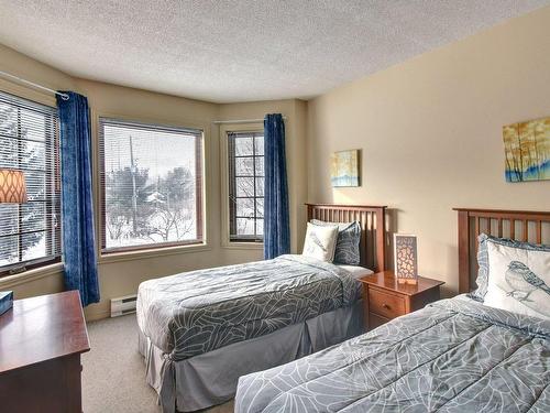 Chambre Ã Â coucher - 1-142 Rue Pinoteau, Mont-Tremblant, QC - Indoor Photo Showing Bedroom