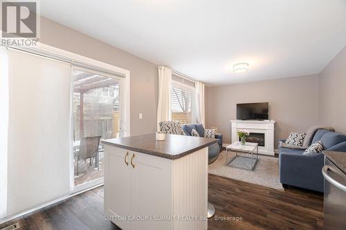 1671 Stover Crescent, Milton, ON - Indoor Photo Showing Living Room With Fireplace