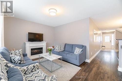 1671 Stover Crescent, Milton, ON - Indoor Photo Showing Living Room With Fireplace