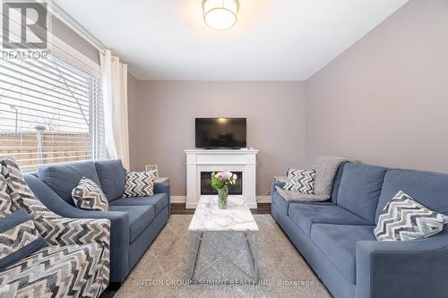 1671 Stover Crescent, Milton, ON - Indoor Photo Showing Living Room With Fireplace