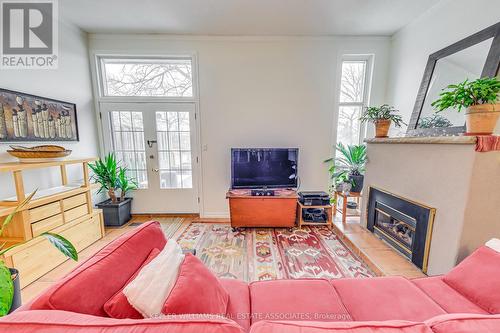 9 - 24 Reid Drive, Mississauga, ON - Indoor Photo Showing Living Room With Fireplace