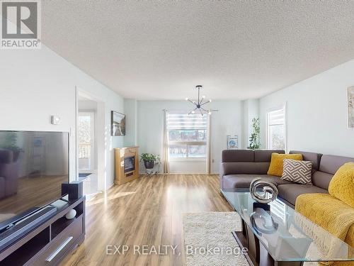 8 - 117 Millstone Drive, Brampton, ON - Indoor Photo Showing Living Room