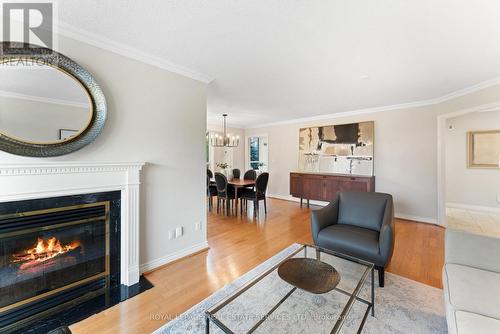 306 - 1 Ripley Avenue, Toronto, ON - Indoor Photo Showing Living Room With Fireplace