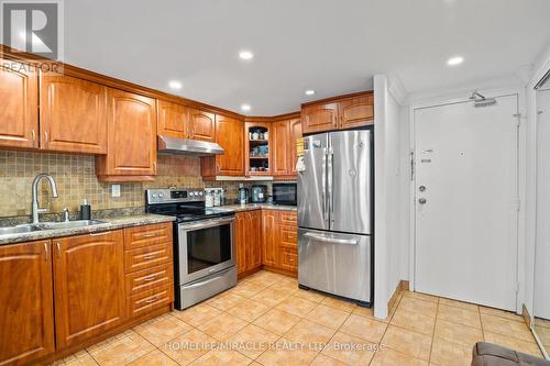 1112 - 4 Lisa Street, Brampton, ON - Indoor Photo Showing Kitchen With Stainless Steel Kitchen With Double Sink