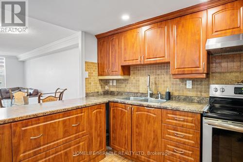 1112 - 4 Lisa Street, Brampton, ON - Indoor Photo Showing Kitchen With Double Sink