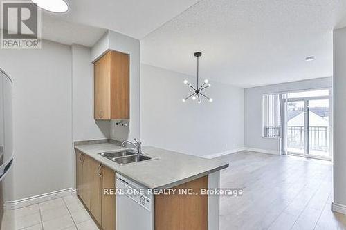 312 - 61 Heintzman Street, Toronto, ON - Indoor Photo Showing Kitchen With Double Sink