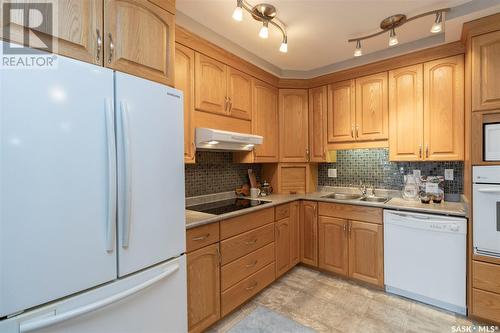 506 902 Spadina Crescent E, Saskatoon, SK - Indoor Photo Showing Kitchen With Double Sink