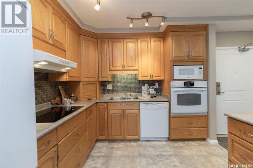 506 902 Spadina Crescent E, Saskatoon, SK - Indoor Photo Showing Kitchen With Double Sink