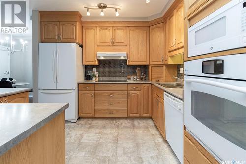 506 902 Spadina Crescent E, Saskatoon, SK - Indoor Photo Showing Kitchen With Double Sink