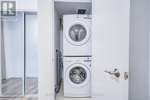 318 - 35 Tubman Avenue, Toronto, ON - Indoor Photo Showing Laundry Room