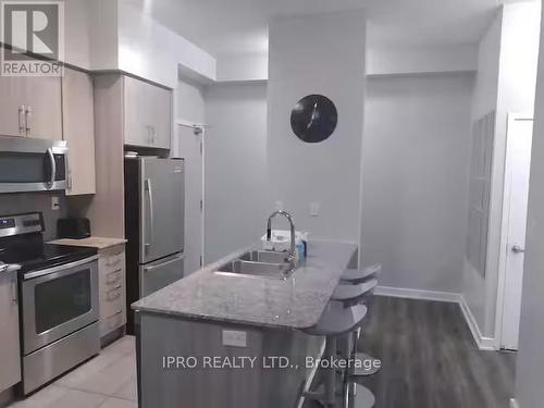 501 - 4065 Brickstone Mews, Mississauga, ON - Indoor Photo Showing Kitchen With Double Sink