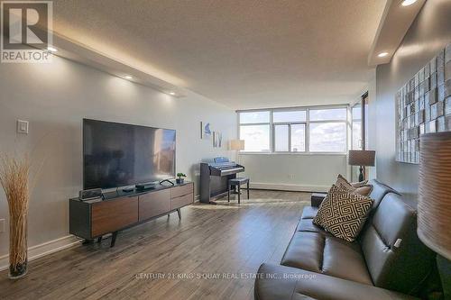 1410 - 2050 Bridletowne Circle, Toronto, ON - Indoor Photo Showing Living Room