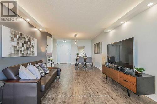 1410 - 2050 Bridletowne Circle, Toronto, ON - Indoor Photo Showing Living Room