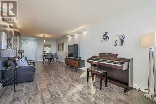 1410 - 2050 Bridletowne Circle, Toronto, ON - Indoor Photo Showing Living Room