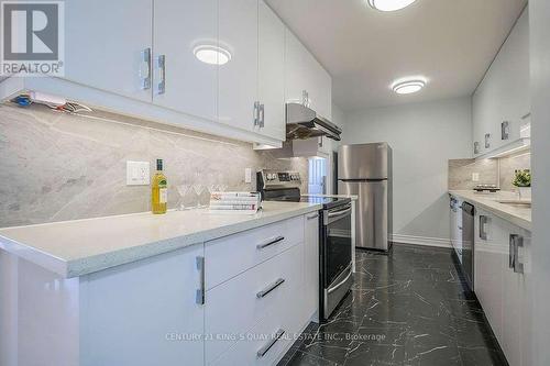 1410 - 2050 Bridletowne Circle, Toronto, ON - Indoor Photo Showing Kitchen With Stainless Steel Kitchen With Upgraded Kitchen