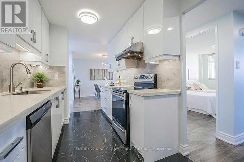 1410 - 2050 Bridletowne Circle, Toronto, ON - Indoor Photo Showing Kitchen With Upgraded Kitchen