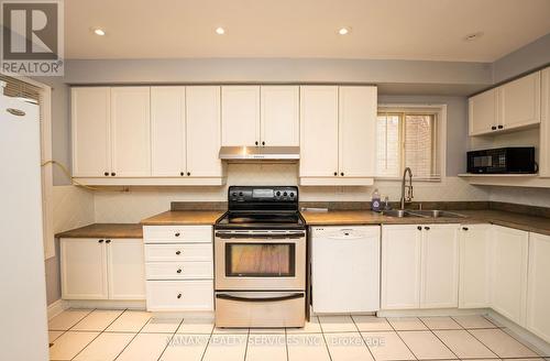 133 Murray St Street E, Brampton, ON - Indoor Photo Showing Kitchen With Double Sink