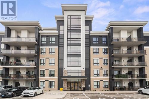 203 - 650 Suave Street, Milton, ON - Outdoor With Balcony With Facade