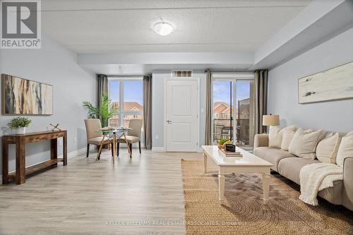 203 - 650 Suave Street, Milton, ON - Indoor Photo Showing Living Room