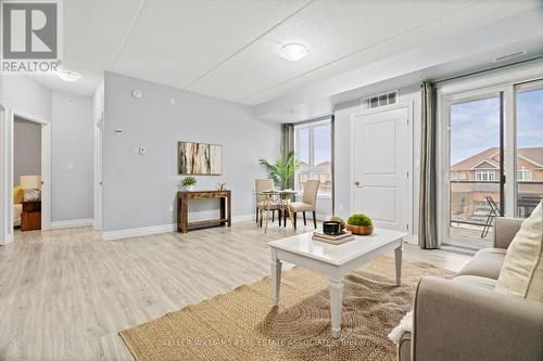 203 - 650 Suave Street, Milton, ON - Indoor Photo Showing Living Room