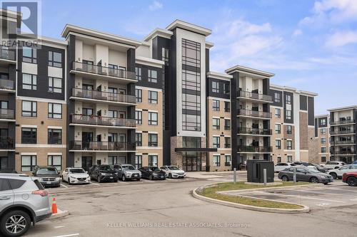 203 - 650 Suave Street, Milton, ON - Outdoor With Balcony With Facade