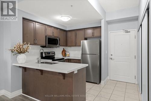 203 - 650 Suave Street, Milton, ON - Indoor Photo Showing Kitchen With Stainless Steel Kitchen