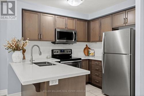 203 - 650 Suave Street, Milton, ON - Indoor Photo Showing Kitchen With Stainless Steel Kitchen With Double Sink With Upgraded Kitchen