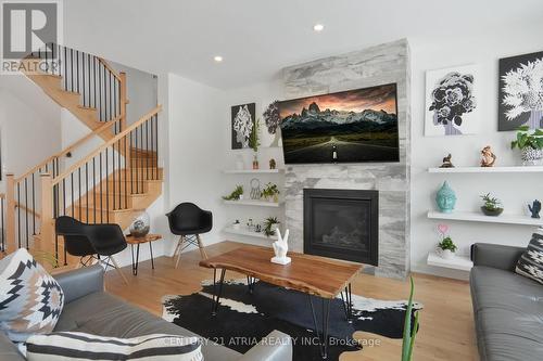 136 Robin Easey Avenue, Ottawa, ON - Indoor Photo Showing Living Room With Fireplace