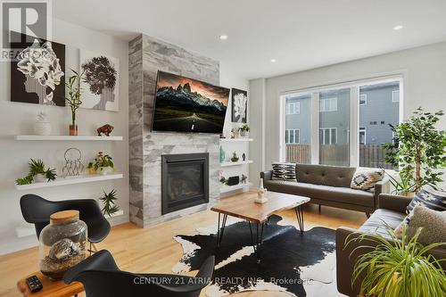 136 Robin Easey Avenue, Ottawa, ON - Indoor Photo Showing Living Room With Fireplace