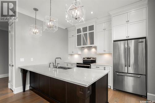 206 404 Cartwright Street, Saskatoon, SK - Indoor Photo Showing Kitchen With Double Sink With Upgraded Kitchen