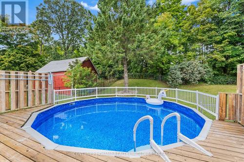 6817 38, South Frontenac (Frontenac South), ON - Outdoor With Above Ground Pool With Deck Patio Veranda With Backyard