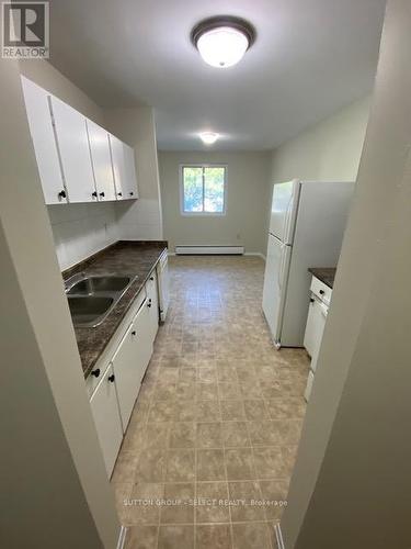 11 - 625 Wonderland Road S, London, ON - Indoor Photo Showing Kitchen With Double Sink