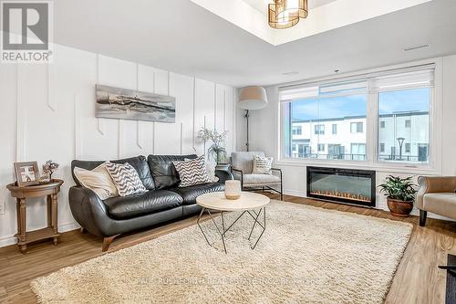 573 Ozawa, Ottawa, ON - Indoor Photo Showing Living Room With Fireplace