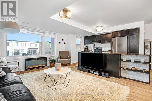 573 Ozawa, Ottawa, ON - Indoor Photo Showing Living Room With Fireplace