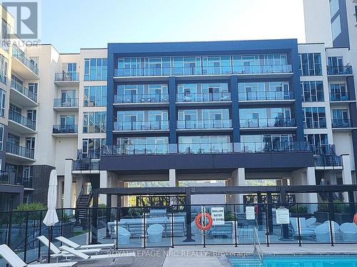 428 - 16 Concord Place, Grimsby (540 - Grimsby Beach), ON - Outdoor With Balcony With Facade