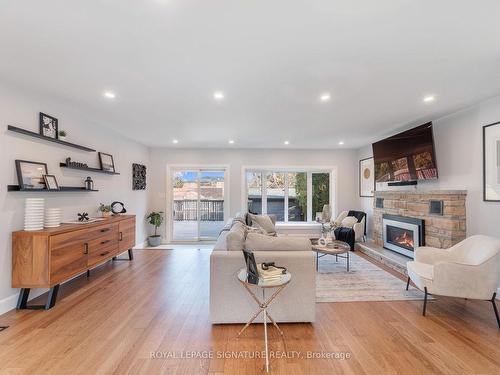 53 Wichey Rd, Toronto, ON - Indoor Photo Showing Living Room With Fireplace