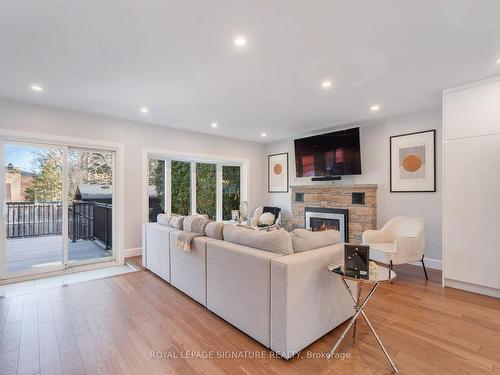 53 Wichey Rd, Toronto, ON - Indoor Photo Showing Living Room With Fireplace