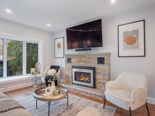 53 Wichey Rd, Toronto, ON - Indoor Photo Showing Living Room With Fireplace