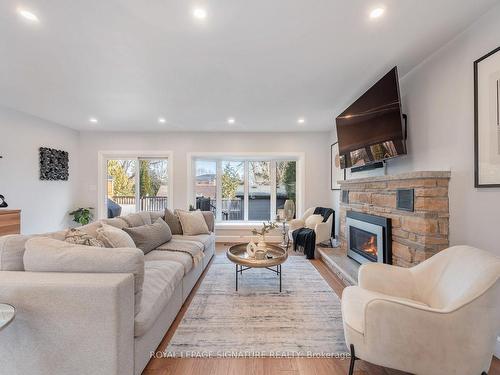 53 Wichey Rd, Toronto, ON - Indoor Photo Showing Living Room With Fireplace