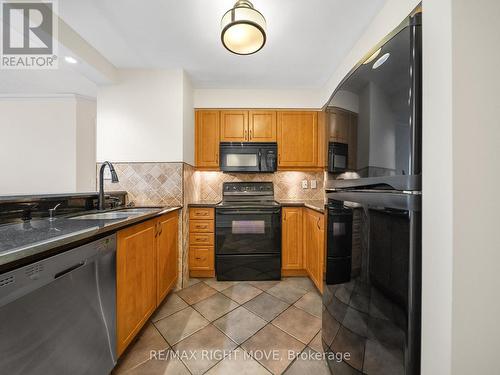 1103 - 140 Dunlop Street E, Barrie, ON - Indoor Photo Showing Kitchen With Double Sink