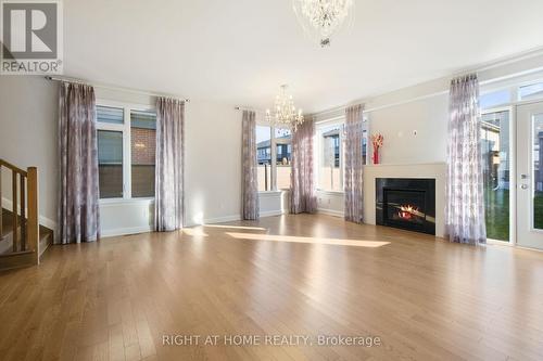 320 Wigwas Street, Ottawa, ON - Indoor Photo Showing Living Room With Fireplace